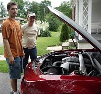 Dad and I looking at the engine.